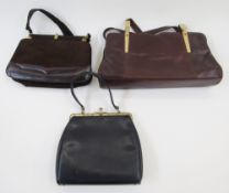 Three vintage handbags, a brown suede bag with brown leather trim, brass coloured hardware, the