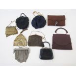 A collection of evening bags to include a black embroidered bag with gilt metal fixed frame