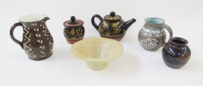 Studio pottery slipware jug, indistinct incised signature to base, trailed with pale blue stylised