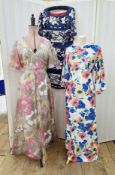 Maxi evening dress labelled Kati Laura Phillips, floral design with capped angel sleeves, 'v'