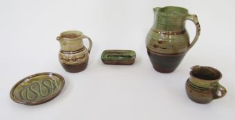 Collection of Winchcombe pottery, comprising: an oviform jug painted in olive green and brown