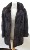 A Charles Moss Furs three-quarter length mink coat.