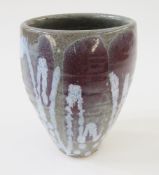 Peter Fishley Holland stoneware vase of compressed tapering form, glazed in mottled red, cream and