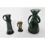 Baron Barnstaple green glazed Art Nouveau-style baluster vase, with frilled rim, incised with fish