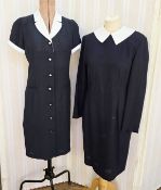 A black crepe coat dress with white collar and white cuffs to short sleeves, labelled Therese