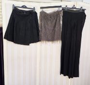 Various skirts, modern and earlier, to include a short black taffeta skirt, labelled Joseph, a