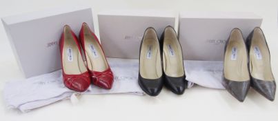 Three pairs of Jimmy Choo stiletto heels, red leather with red printed lizard detail, size 40.5 with