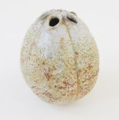 Alan Wallwork (1931-2019), a stoneware seed pod form vase, incised AW, enriched in a pale speckled