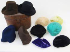 Large collection of vintage hats, to include feathered cocktail hats, a gentleman's bowler