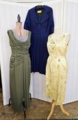 A yellow 1960's cocktail dress, embroidered with green and yellow flowers, satin belt with bow, a