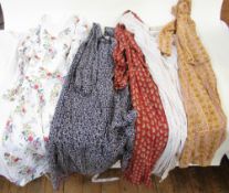 Three printed Indian cotton dresses, a white nylon chiffon dress labelled 'Parigi', labelled size