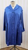 Blue satin evening coat, labelled 'Worth of Grosvenor Street', there is piping to the edge on the