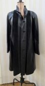 A leather and suede full length coat, labelled Roisin Designs Dublin, size 10, front button