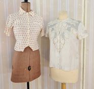 Four various blouses, to include white with red embroidery, capped sleeves, fitted waist with a