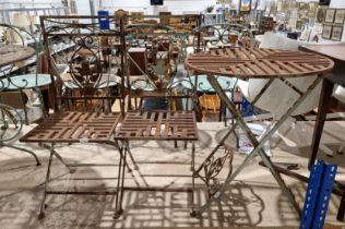 A three-piece garden bistro set comprising a circular folding table, 61cm dia x 74cm high, with a