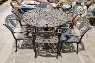 A cast iron garden table, circular on a classical style pedestal base, pierced decorated top in