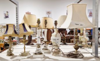 Pair of brass gothic style table lamps with coloured shades, 32cm high, together with another