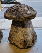 A stone staddlestone with large wide base, top 52cm diameter, stand 50cm at base, 74cm max height