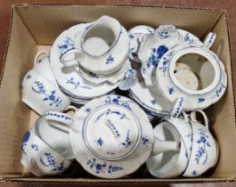 A French blue and white pattern part tea service marked Décor à la Main à Chantilly, including