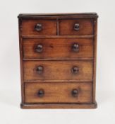 19th-century tabletop apprentice piece mahogany miniature chest of drawers, the rectangular top with