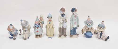 Group of Lladro porcelain figures of clowns, printed and impressed factory marks, all with musical