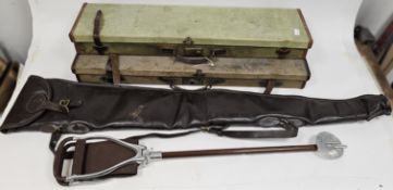 Two early 20th-century canvas and leather gun cases, one with a label to the interior for Edward