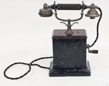 Early 20th-century hand-crank desk telephone made by Telefonaktiebolaget L.M. Ericsson in Sweden, of