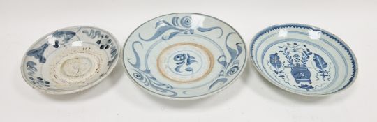 Three Chinese porcelain blue and white dishes, a Swatow dish painted with blue scrolling leaves,