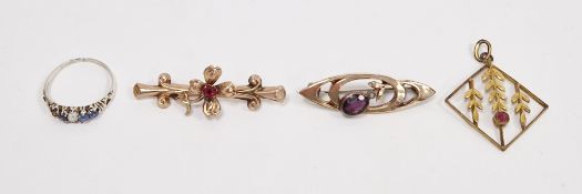 Late 19th / early 20th-century 9ct gold and ruby bar brooch, of flower and foliate scroll form set