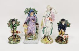 Staffordshire pearlware figure of Diana, circa 1810, standing with a quiver of arrows, on a tree-