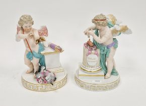 Pair of Meissen (outside decorated) figures of Cupid, circa 1880, blue crossed swords and