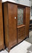 Mid-20th century French bedroom suite by Perrenoud Meubles, mahogany viz:- kneehole dressing table