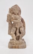 Indian brown sandstone carved figure of a celestial dancer or temple figure, 26cm high