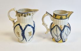 Two English Prattware leaf-moulded jugs, early 19th century, each moulded with overlapping leaves,