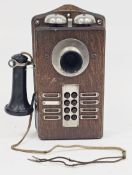 Early 20th-century oak-cased intercom telephone system, wall-mounted, made by the Connecticut