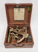 Early 20th-century brass sextant, no. 9527, fitted in a mahogany case, the inner lid bearing a