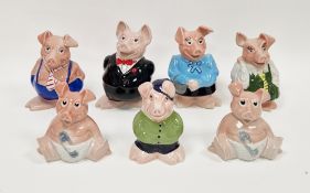 Seven Wade pottery Natwest piggy banks, moulded marks, with a Natwest compliments slip, 19 cm high