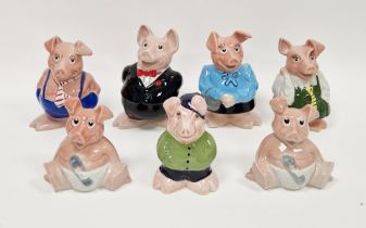 Seven Wade pottery Natwest piggy banks, moulded marks, with a Natwest compliments slip, 19 cm high