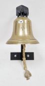Royal Navy ship's bell, probably World War era, with a Broad Arrow mark, cast-iron crown top,