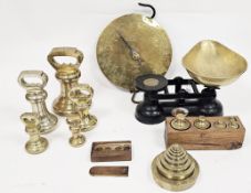 Matched set of five graduating brass bell weights, largest 20cm high, together with brass Salter