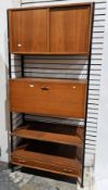V Mid-century Staples Ladderax modular teak wall unit, comprising a cupboard with sliding doors