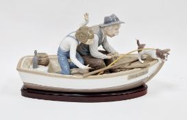 Lladro figure of 'Fishing with Gramps', modelled with a grandfather, boy and dog in a fishing