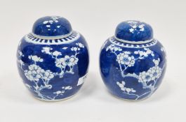 Pair of Chinese porcelain blue and white prunus pattern ginger jars, Qing Dynasty, each painted with