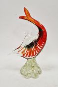 Large art glass model of a leaping marlin, raised on naturalistic wave form foot, 40cm high