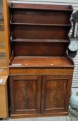 19th-century mahogany bookcase cabinet, the upper section with two waterfall shelves over a long