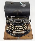 Early 20th-century Imperial Model B typewriter, circa 1915, serial no. 23182, in tin domed-top case