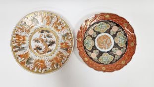 Japanese imari dish, 19th century, painted to the centre with a phoenix amongst clouds, within a