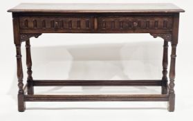 20th-century Jacobean revival oak side table, the rectangular top over two frieze drawers with
