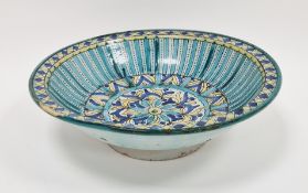 Moroccan pottery bowl, late 19th/early 20th century, painted in shades of blue, turquoise and yellow