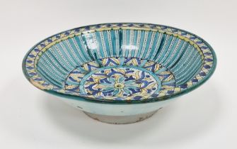 Moroccan pottery bowl, late 19th/early 20th century, painted in shades of blue, turquoise and yellow